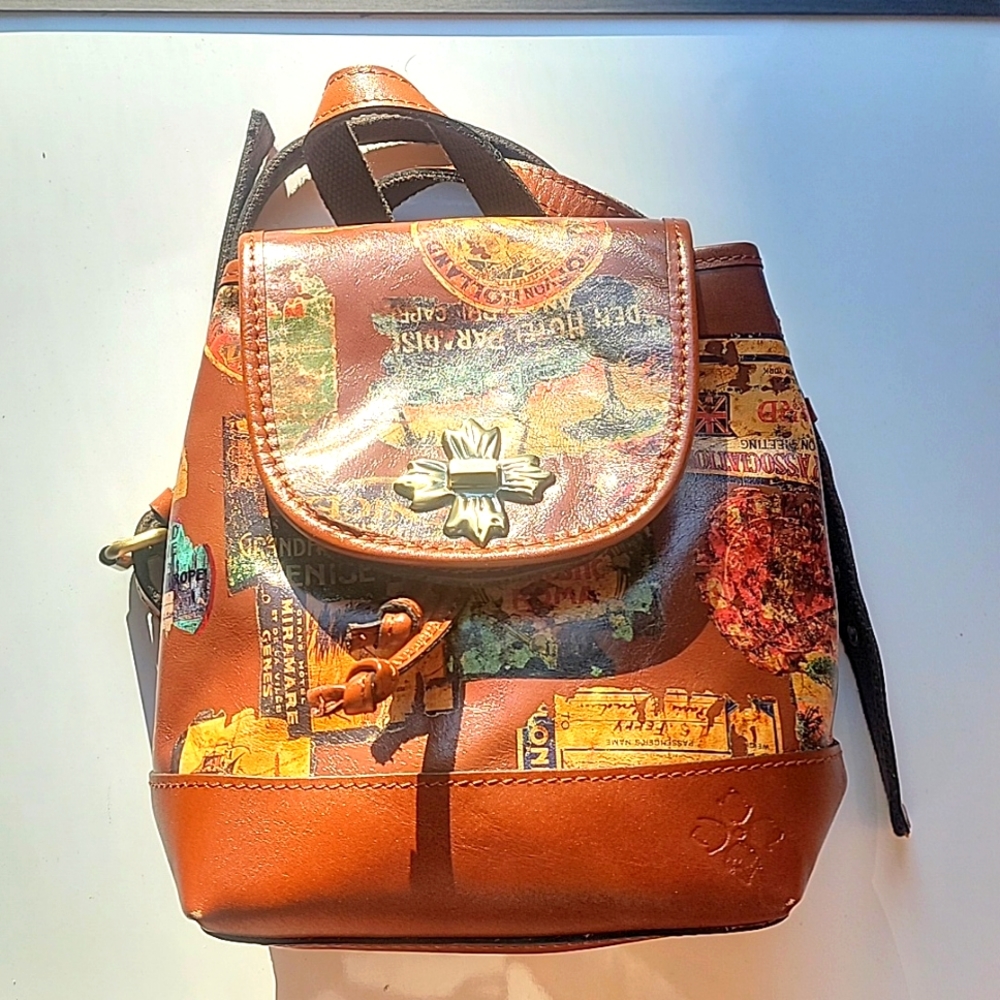 Patricia Nash Leather Saracena Flap Vintage Travel Sticker Drawstring Backpack